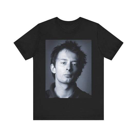 A black graphic t-shirt featuring an enigmatic graphic of Thom Yorke from Radiohead as a frontman.