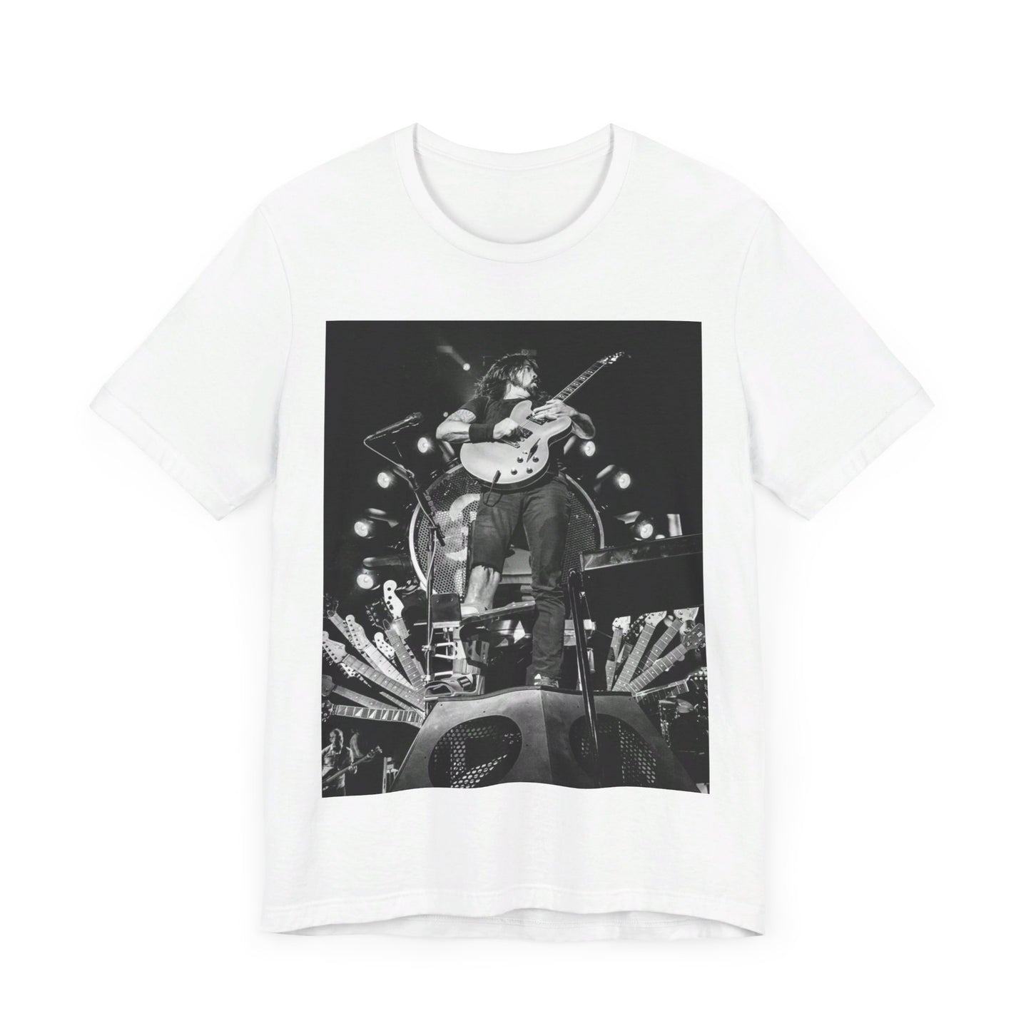 A black graphic t-shirt featuring a vintage photo of Foo Fighters performing live.