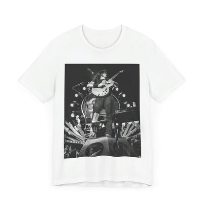 A black graphic t-shirt featuring a vintage photo of Foo Fighters performing live.
