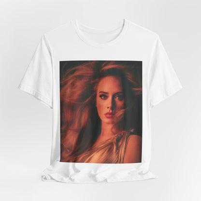 A black graphic t-shirt featuring a glamorous portrait of Adele wearing a golden gown, with voluminous hair, bathed in warm lighting, giving an editorial look.