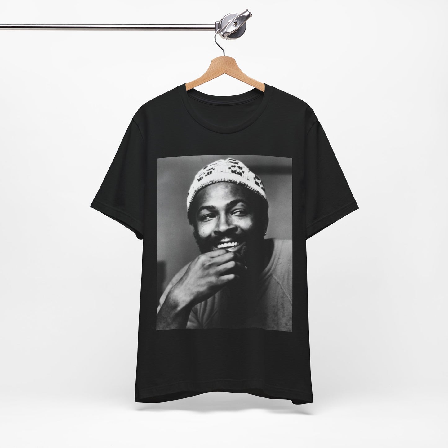 A black graphic t-shirt featuring a 70s retro portrait graphic of Marvin Gaye.