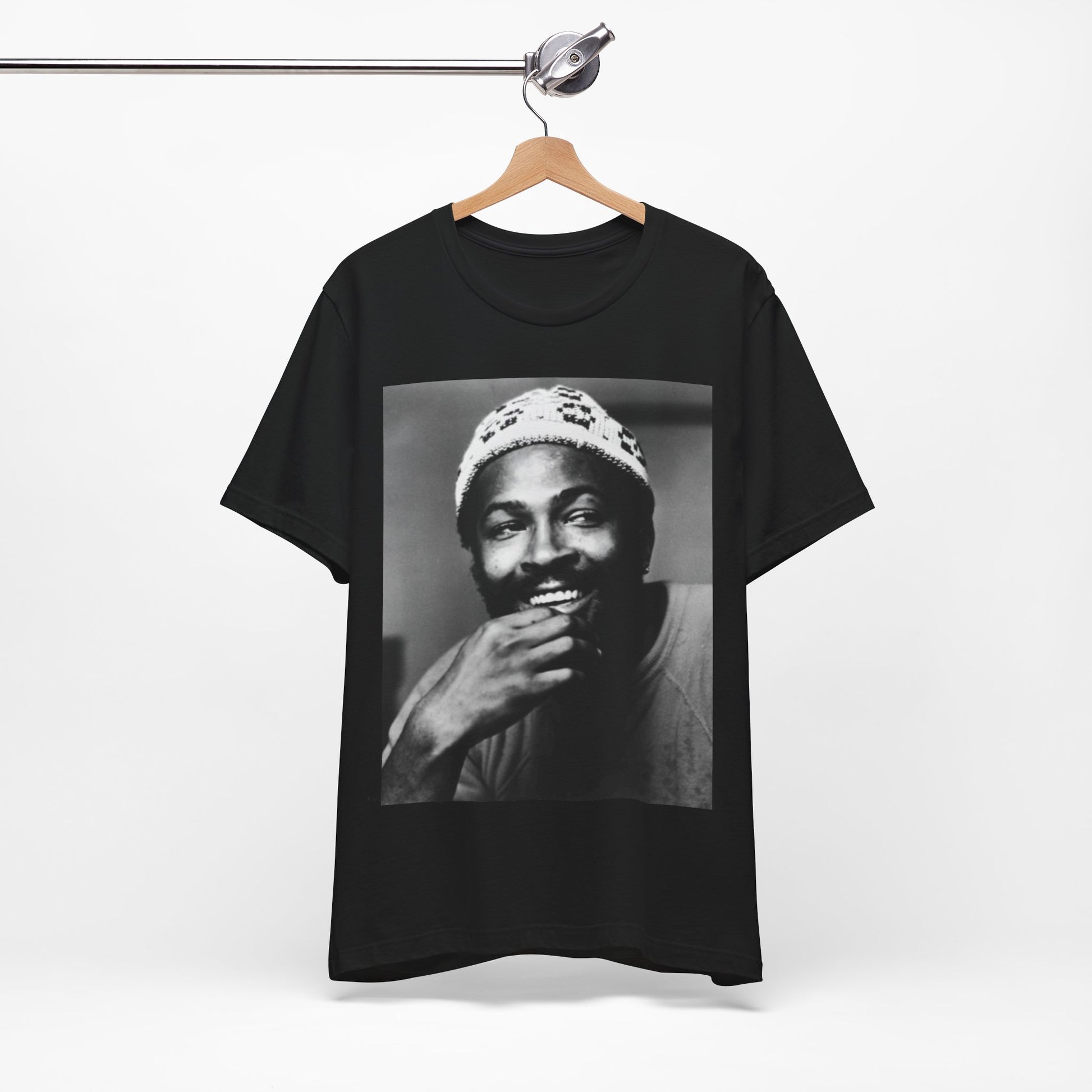 A black graphic t-shirt featuring a 70s retro portrait graphic of Marvin Gaye.
