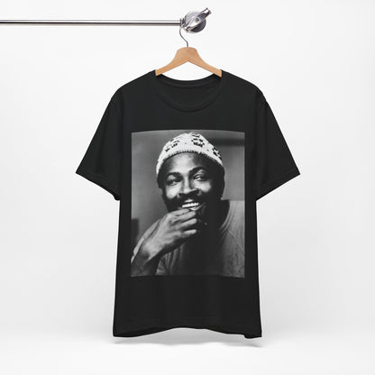 A black graphic t-shirt featuring a 70s retro portrait graphic of Marvin Gaye.