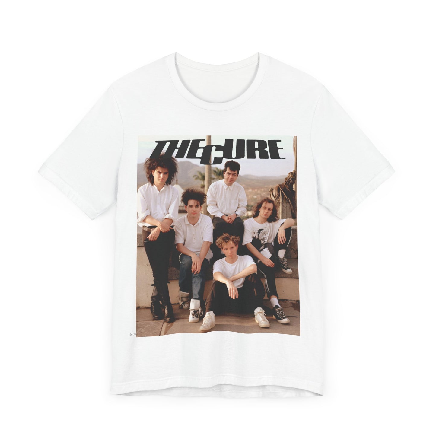 A black graphic t-shirt featuring a vintage graphic of The Cure with a dark romanticism theme.