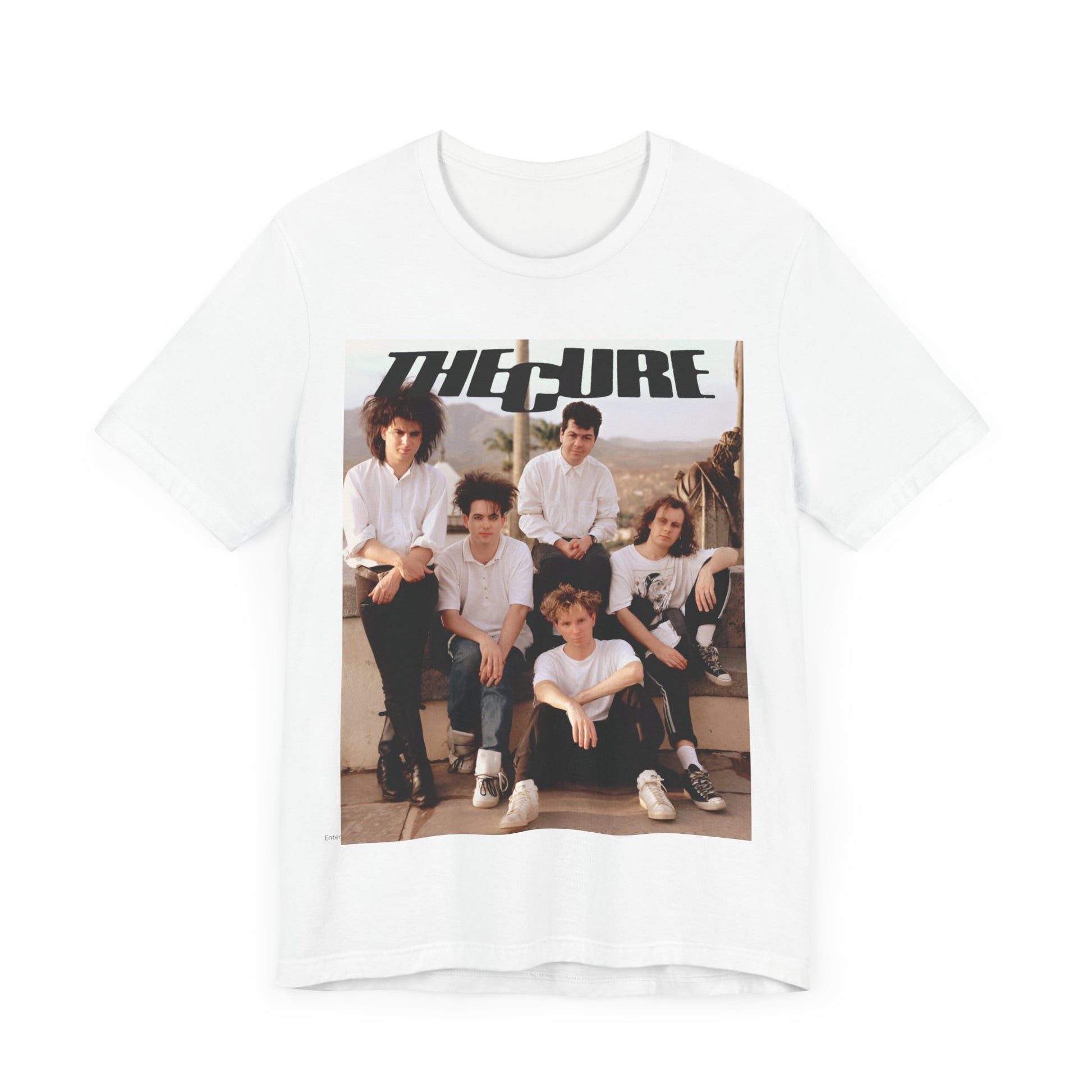 A black graphic t-shirt featuring a vintage graphic of The Cure with a dark romanticism theme.