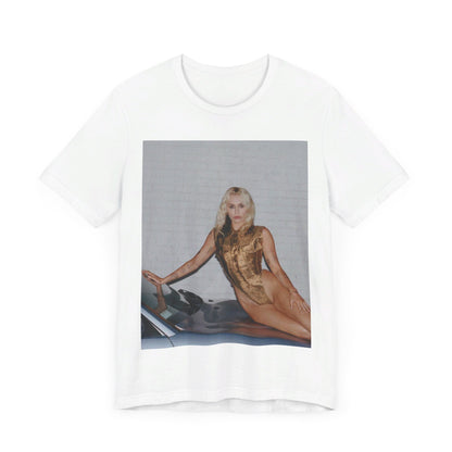 A black graphic t-shirt featuring an iconic fashion graphic of Miley Cyrus.