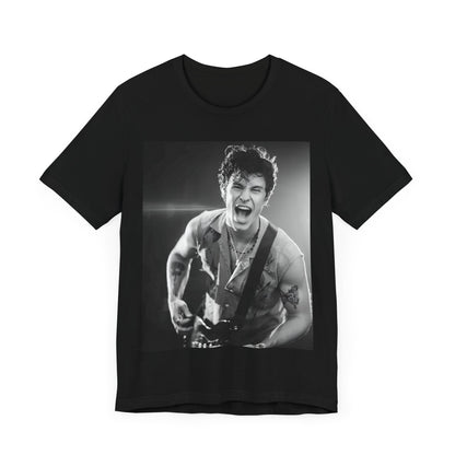 A black graphic t-shirt featuring a black and white photo of Shawn Mendes, emphasizing his charm.