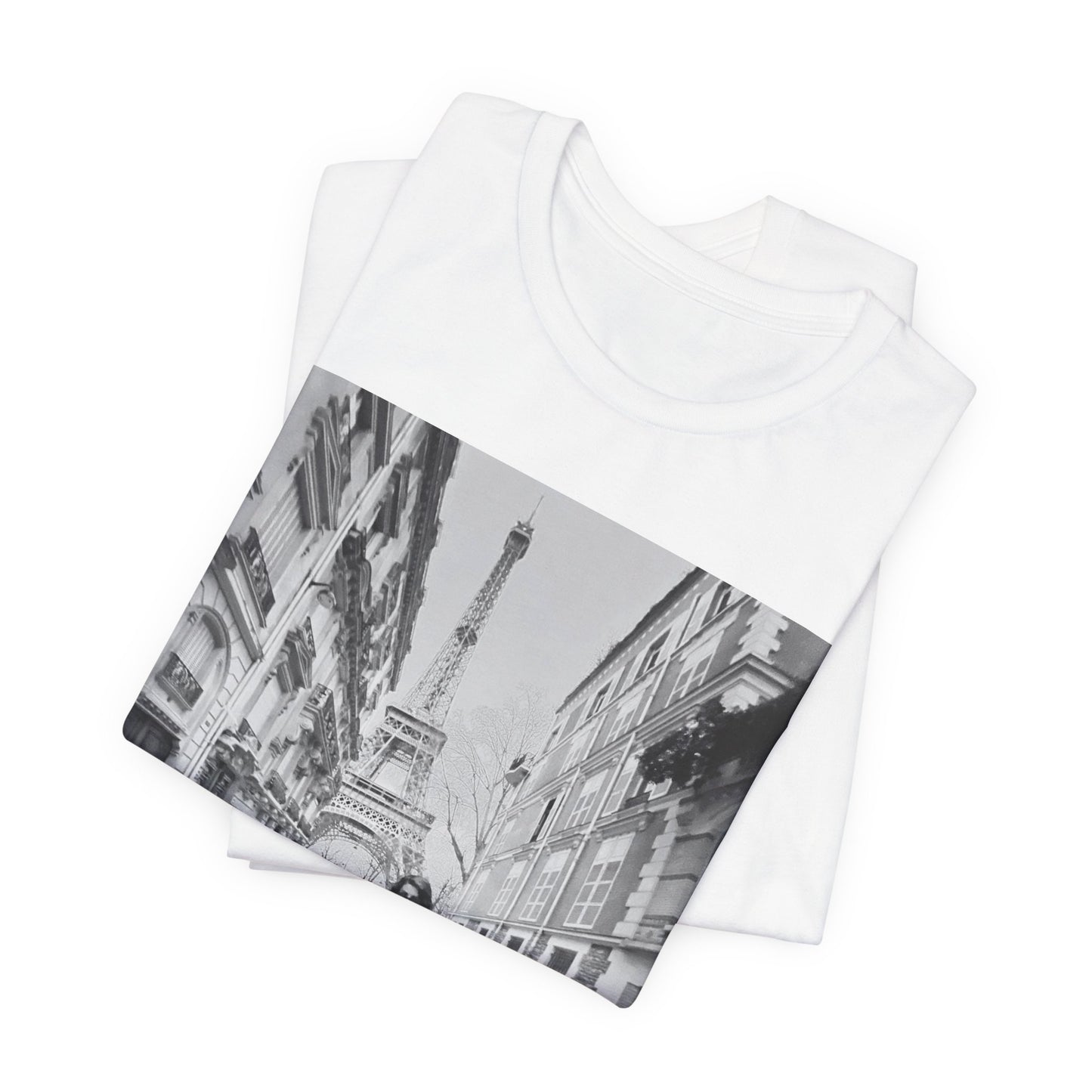 A black graphic t-shirt featuring a black and white photo of Selena Gomez in Paris.