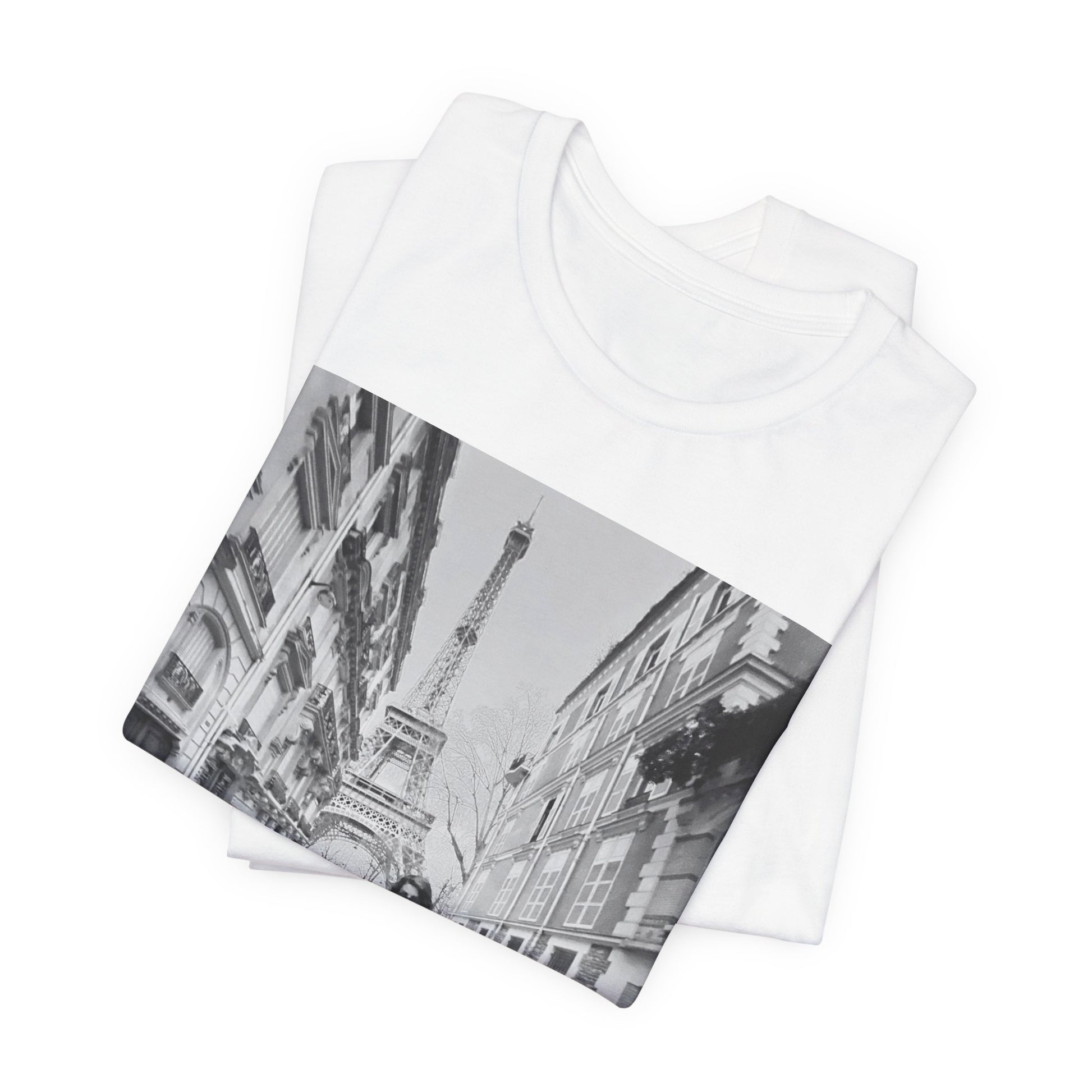 A black graphic t-shirt featuring a black and white photo of Selena Gomez in Paris.