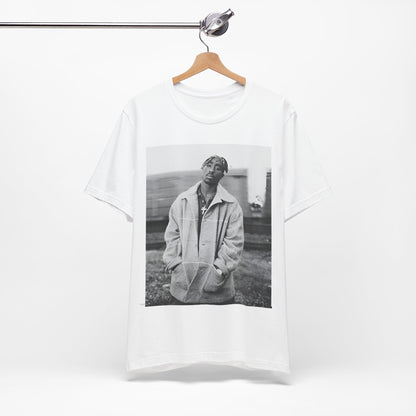 A black graphic t-shirt featuring a graphic related to Tupac's 'Thug Life' philosophy.