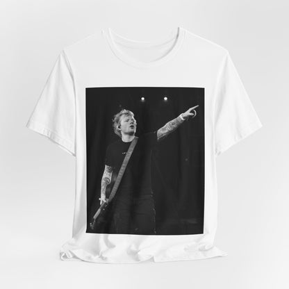 A black graphic t-shirt featuring a black and white graphic or photo of Ed Sheeran performing live on stage.