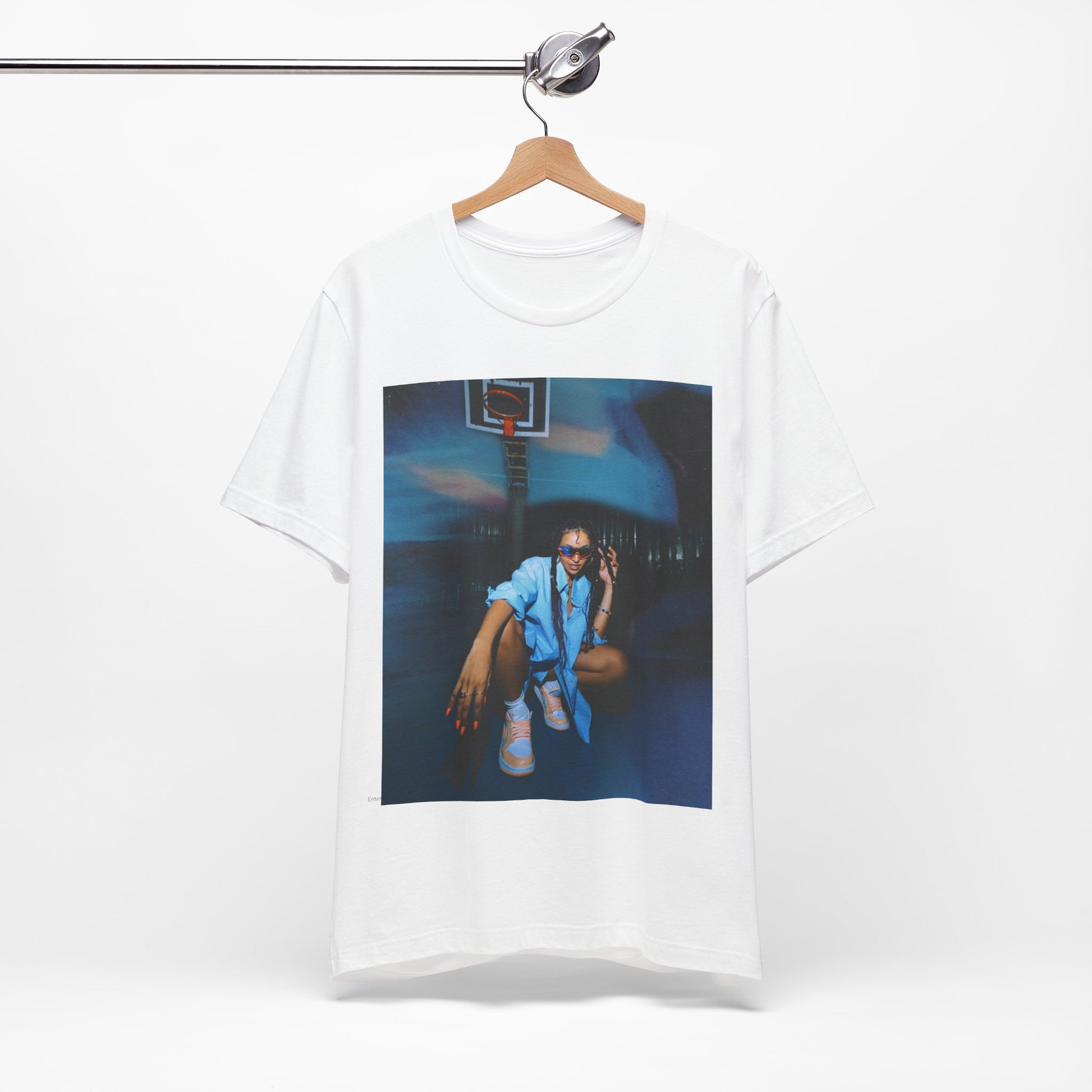 A black graphic t-shirt featuring an indie R&B streetwear graphic of Tinashe.