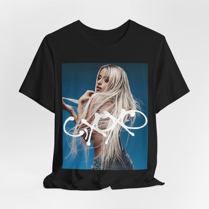 A black graphic t-shirt featuring a graphic related to Camila Cabello's C,XOXO album.