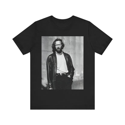 A black graphic t-shirt featuring a retro graphic related to Eric Clapton's 'Cocaine' song or era.