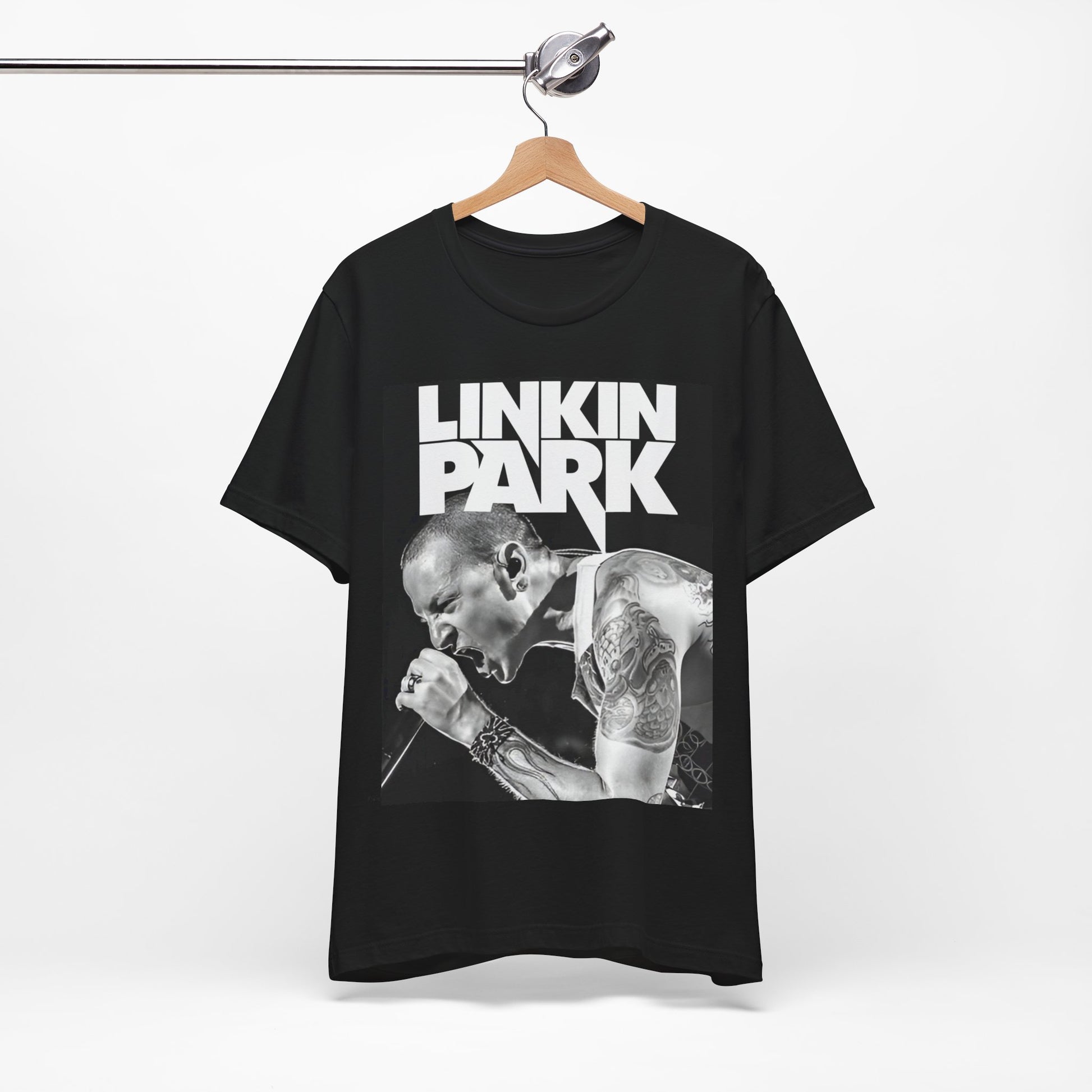 A black graphic t-shirt featuring a black and white graphic or photo portrait of Chester Bennington from Linkin Park.