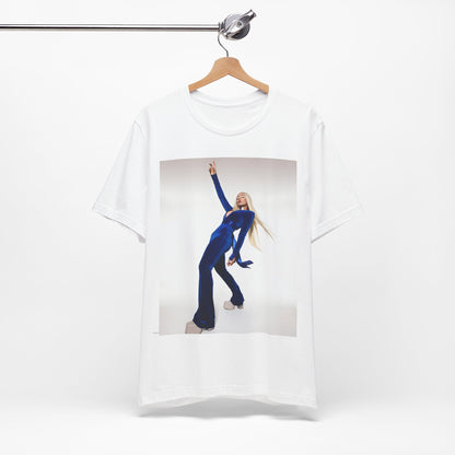 A black graphic t-shirt featuring Ava Max in a blue jumpsuit, in a graphic or photo style.