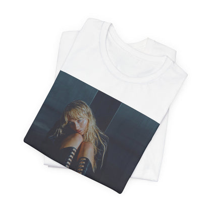 A black graphic t-shirt featuring a bold graphic of Sabrina Carpenter as a pop superstar.