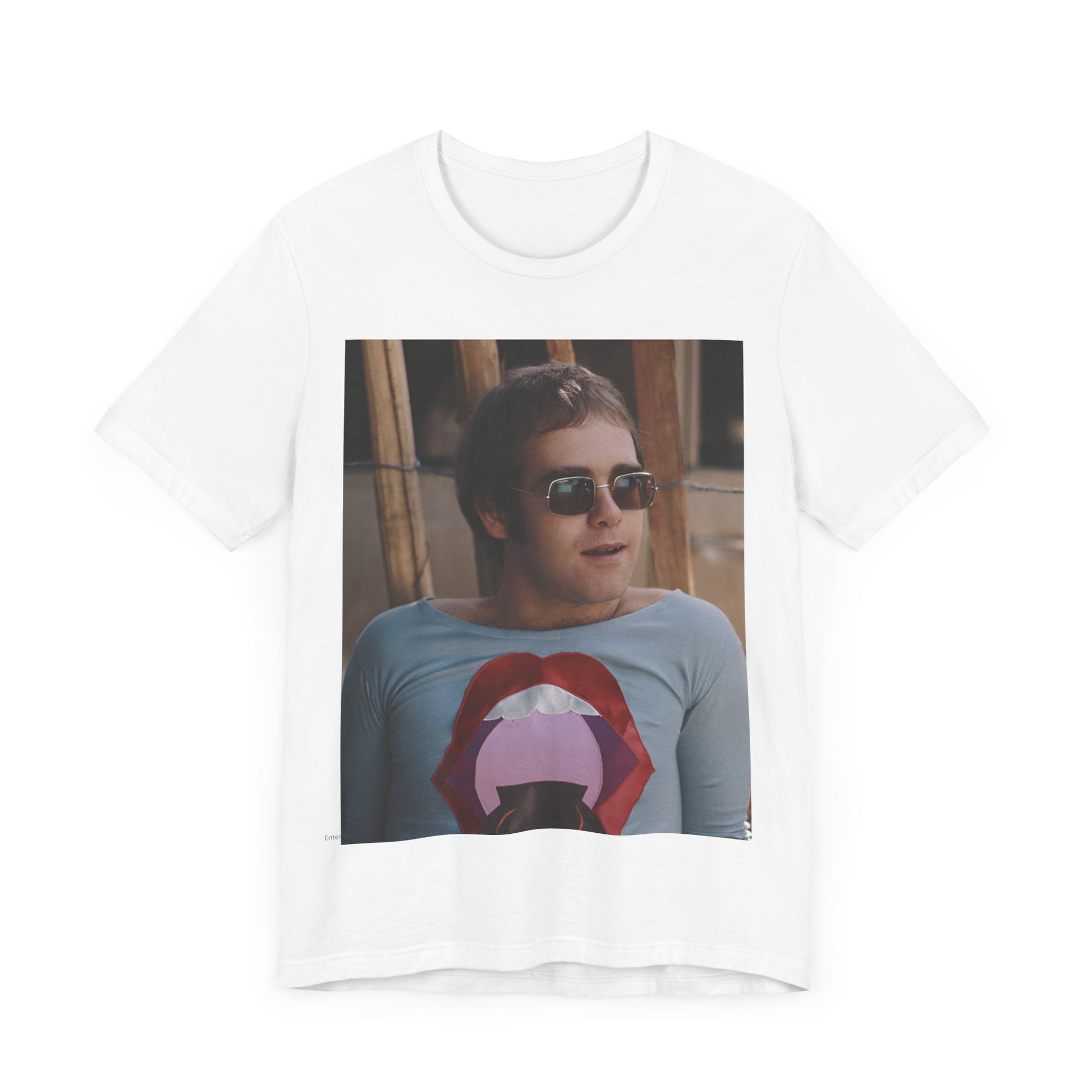 A black graphic t-shirt featuring a classic graphic related to Elton John's 'Tiny Dancer' song or era.