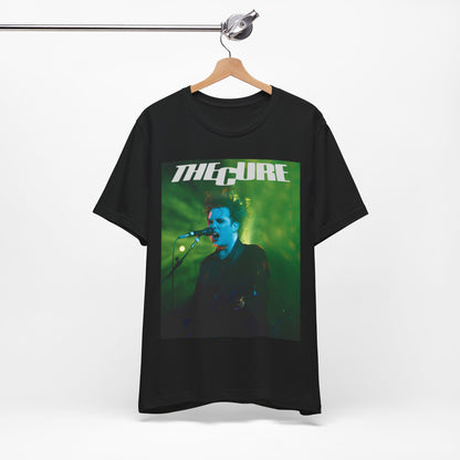 A black graphic t-shirt featuring a graphic or photo of The Cure performing live on stage.