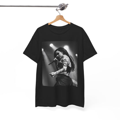 A black graphic t-shirt featuring a glamorous graphic or photo of Kehlani performing on stage.