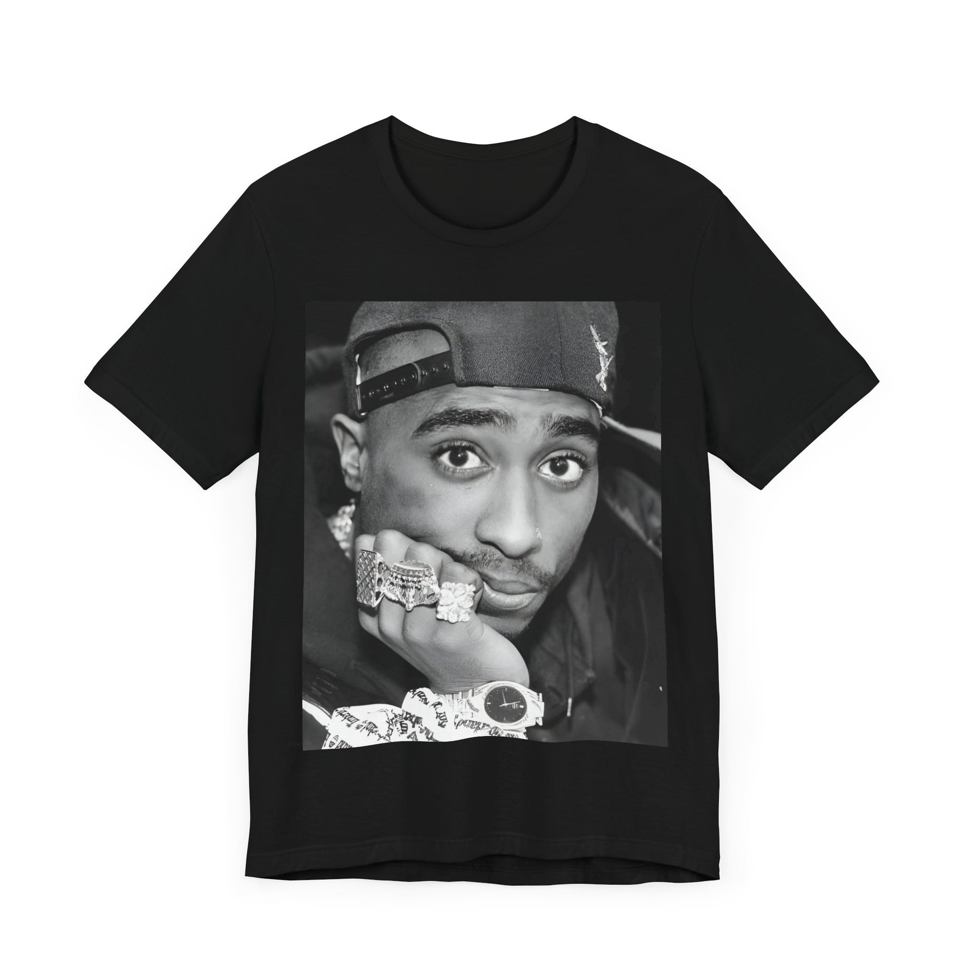 A black graphic t-shirt featuring a bold graphic of Tupac as a rap superstar.