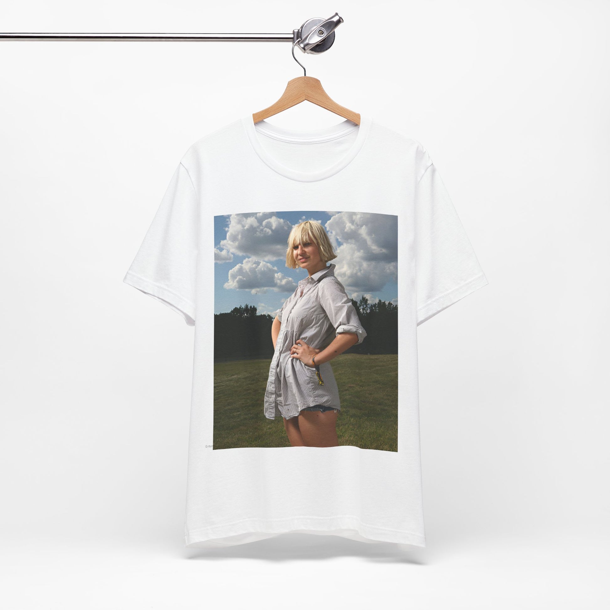 A black graphic t-shirt featuring a bold graphic of Sia as a pop superstar.