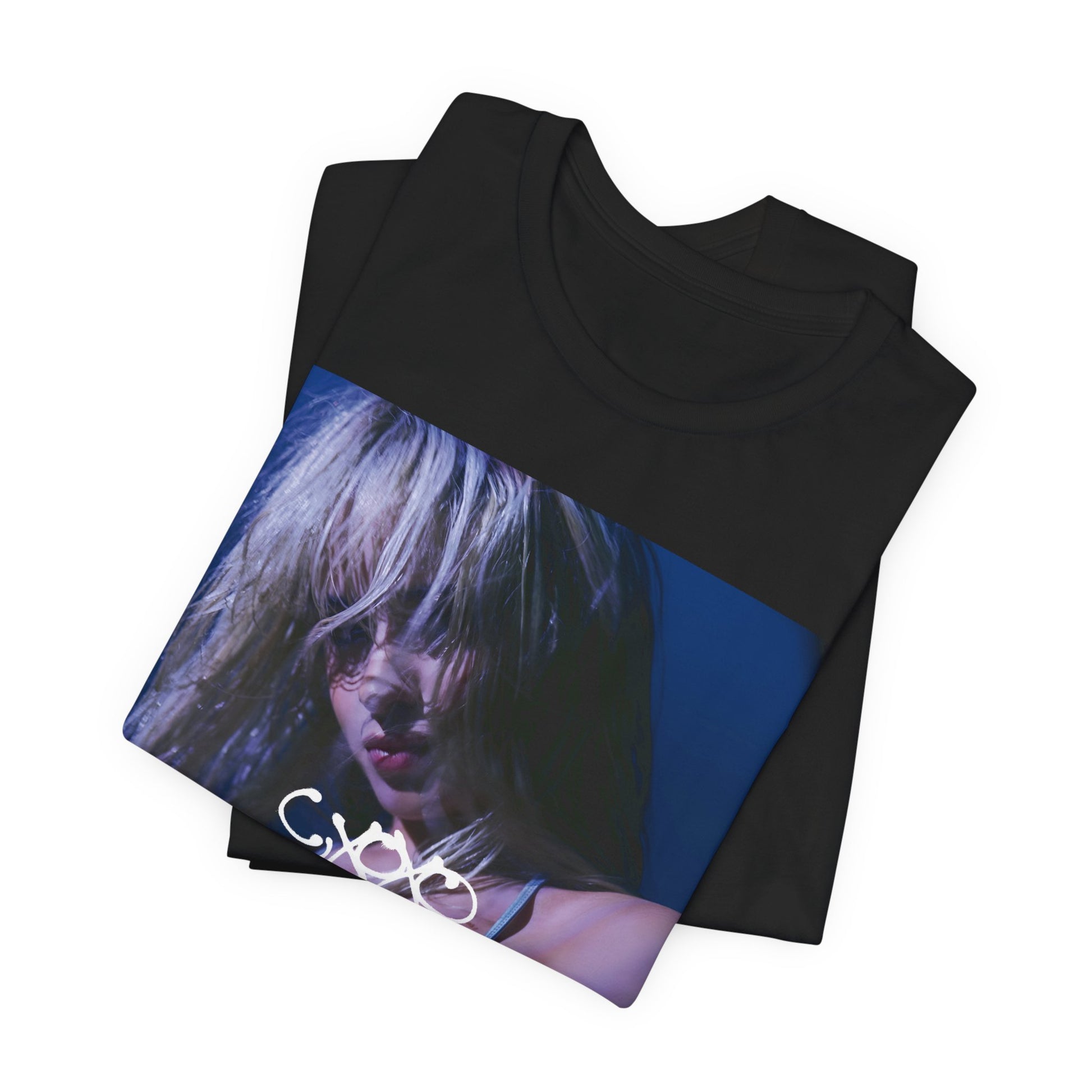 A black graphic t-shirt featuring a bold aesthetic graphic related to Camila Cabello's C,XOXO' album.