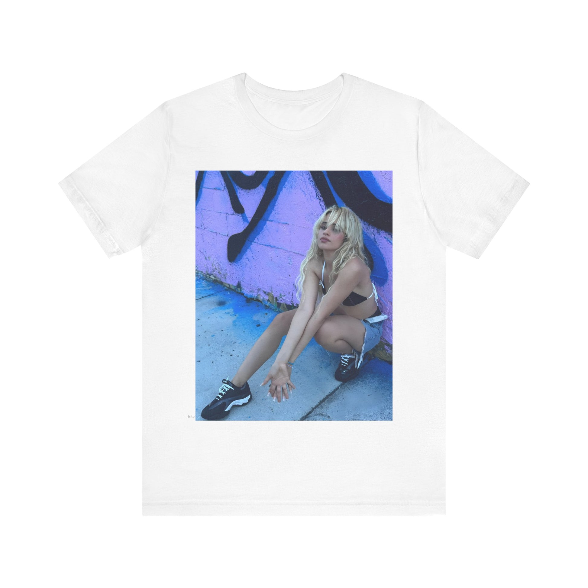 A black graphic t-shirt featuring a photo of Camila Cabello from her "Romance" album era.