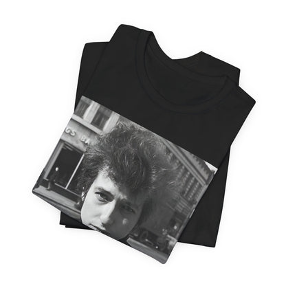 A black graphic t-shirt featuring a 60s black and white photo portrait of Bob Dylan.
