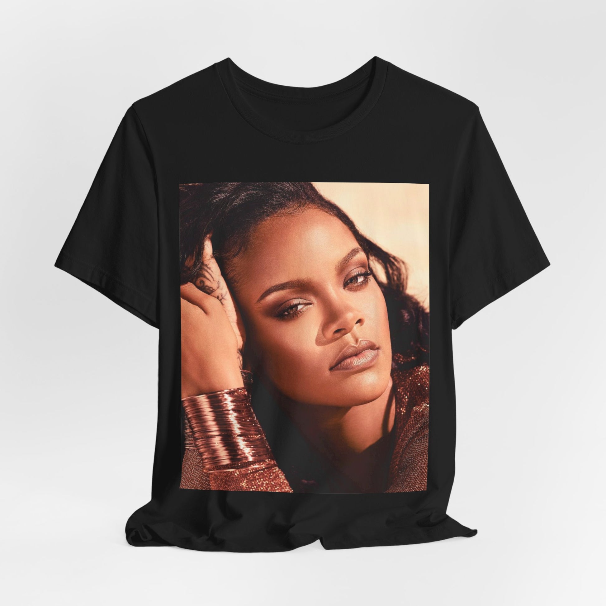 A black graphic t-shirt featuring a retro graphic related to Rihanna's 'Good Girl Gone Bad' album era.