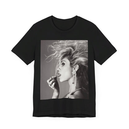 A black graphic t-shirt featuring a graphic of Miley Cyrus as a grunge rockstar.