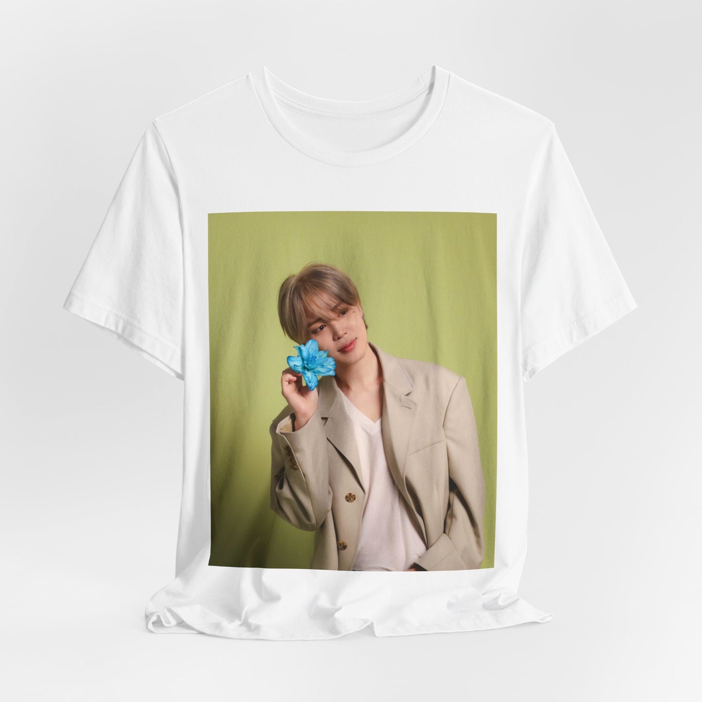 A black graphic t-shirt featuring a vintage K-Pop aesthetic graphic of Jimin.
