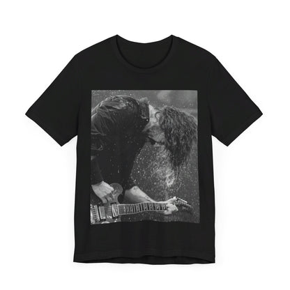 A black graphic t-shirt featuring a graphic of Dave Grohl from Foo Fighters, emphasizing his fierce on-stage presence.