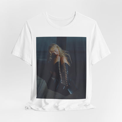 A black graphic t-shirt featuring a bold graphic of Sabrina Carpenter as a pop superstar.