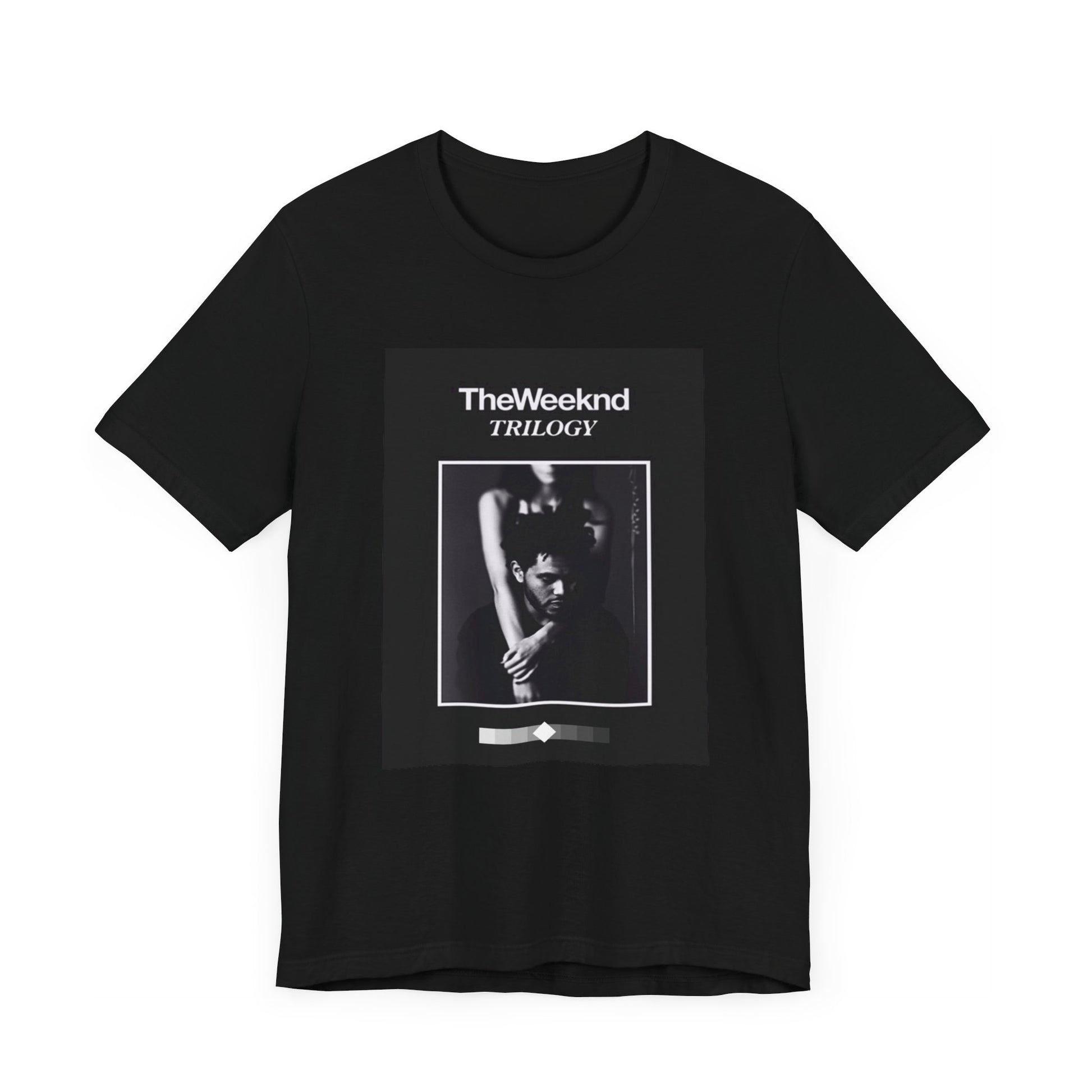 A black graphic t-shirt featuring a graphic related to The Weeknd's 'Trilogy' album.