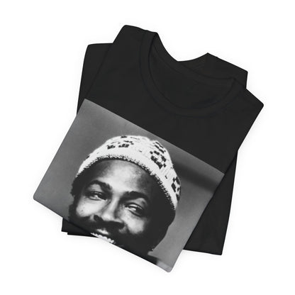 A black graphic t-shirt featuring a 70s retro portrait graphic of Marvin Gaye.