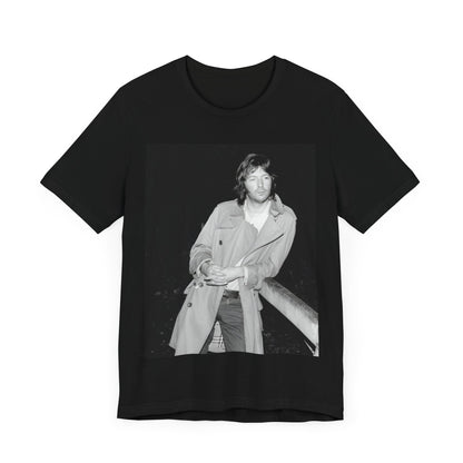 A black graphic t-shirt featuring a retro graphic of Eric Clapton as a blues master.