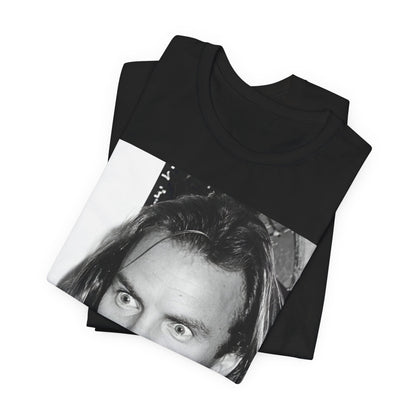 A black graphic t-shirt featuring a retro graphic related to Sting's 'Synchronicity' album era.