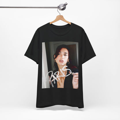 A black graphic t-shirt featuring a graphic of Dua Lipa, possibly with Parisian elements or a 'Paris' theme.