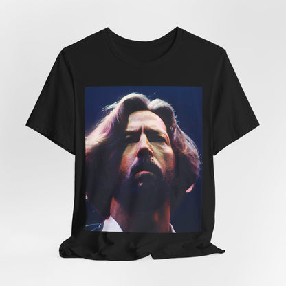 A black graphic t-shirt featuring a graphic related to Eric Clapton's 'Tears in Heaven' song or era.