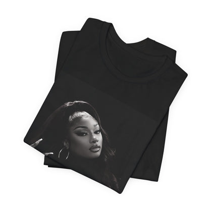 A black graphic t-shirt featuring a black and white, monochrome graphic or photo of Megan Thee Stallion.