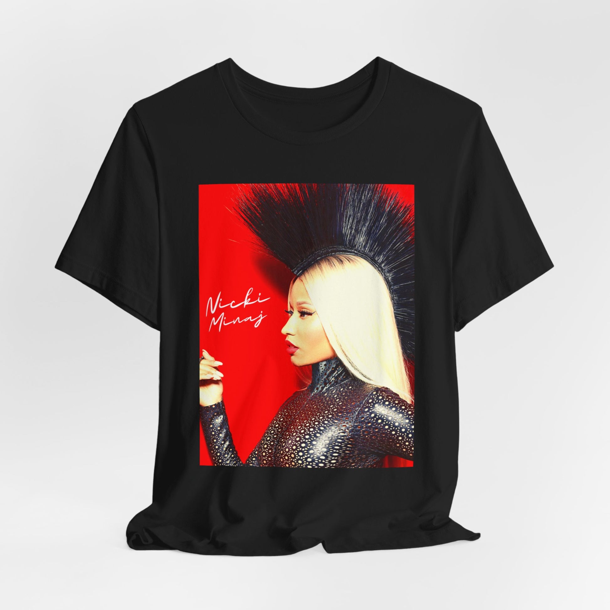 A black graphic t-shirt featuring a graphic of Nicki Minaj as a female rap pioneer.