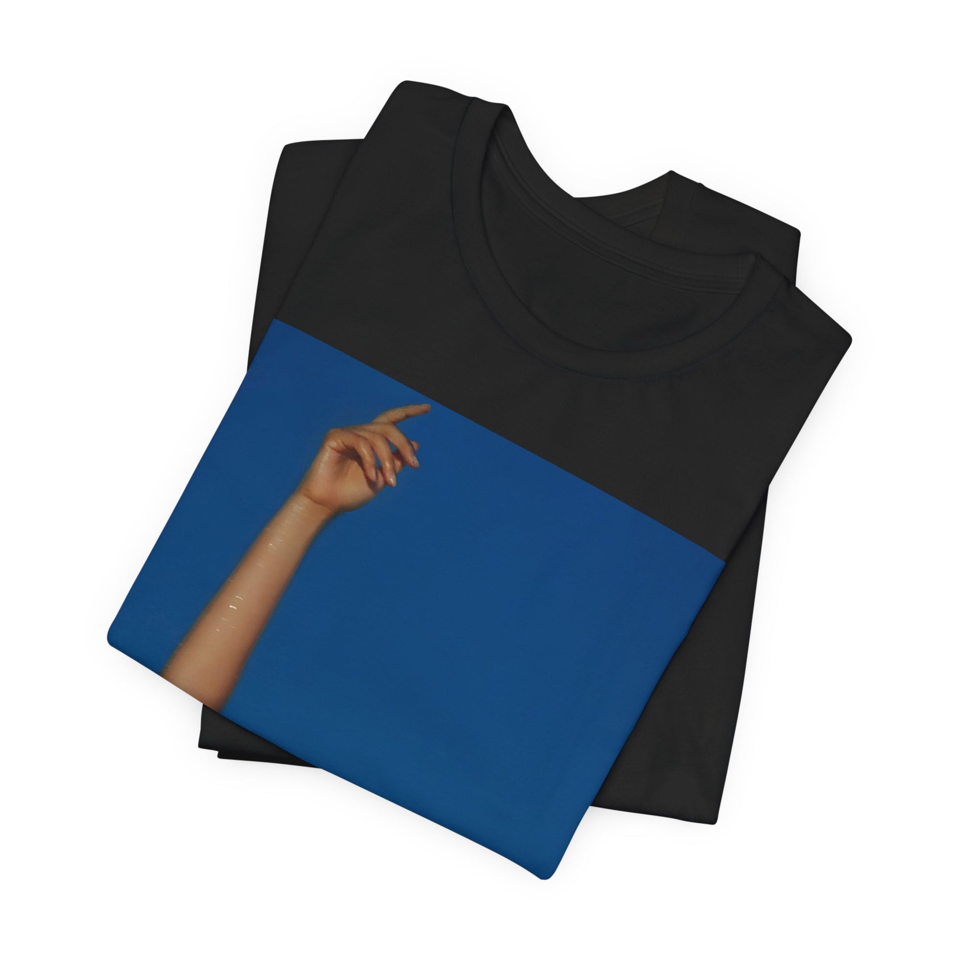 A black graphic t-shirt featuring a graphic related to Camila Cabello's C,XOXO album.