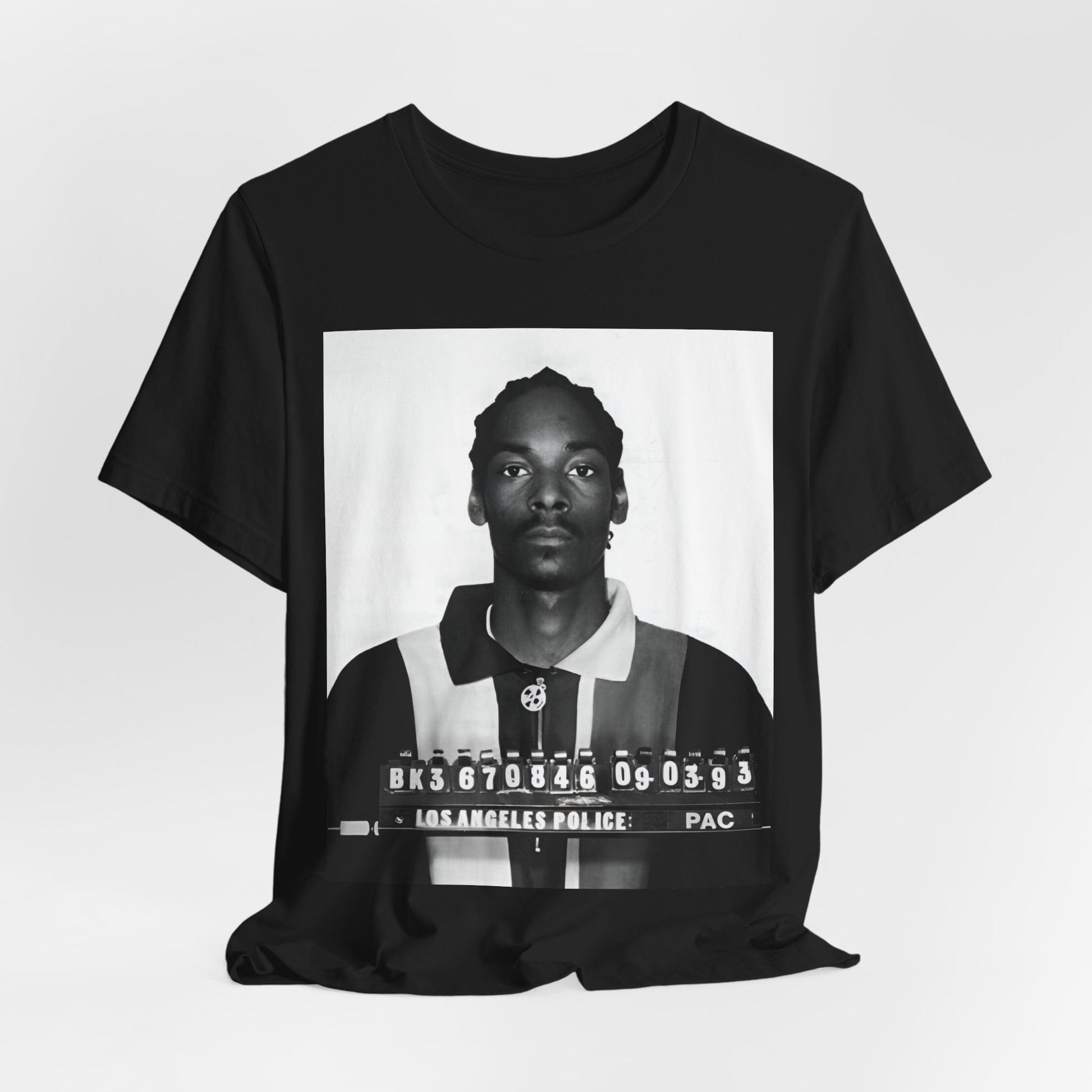A black graphic t-shirt featuring a graphic of Snoop Dogg's mug shot.