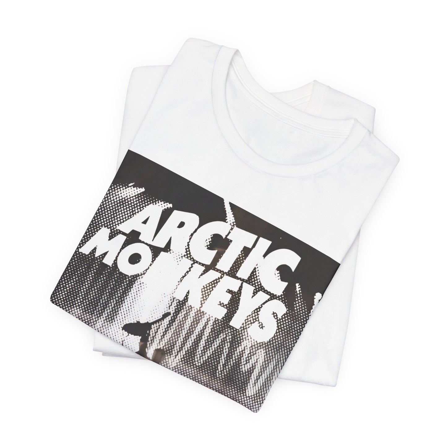 A black graphic t-shirt featuring a retro-style logo for the band Arctic Monkeys.