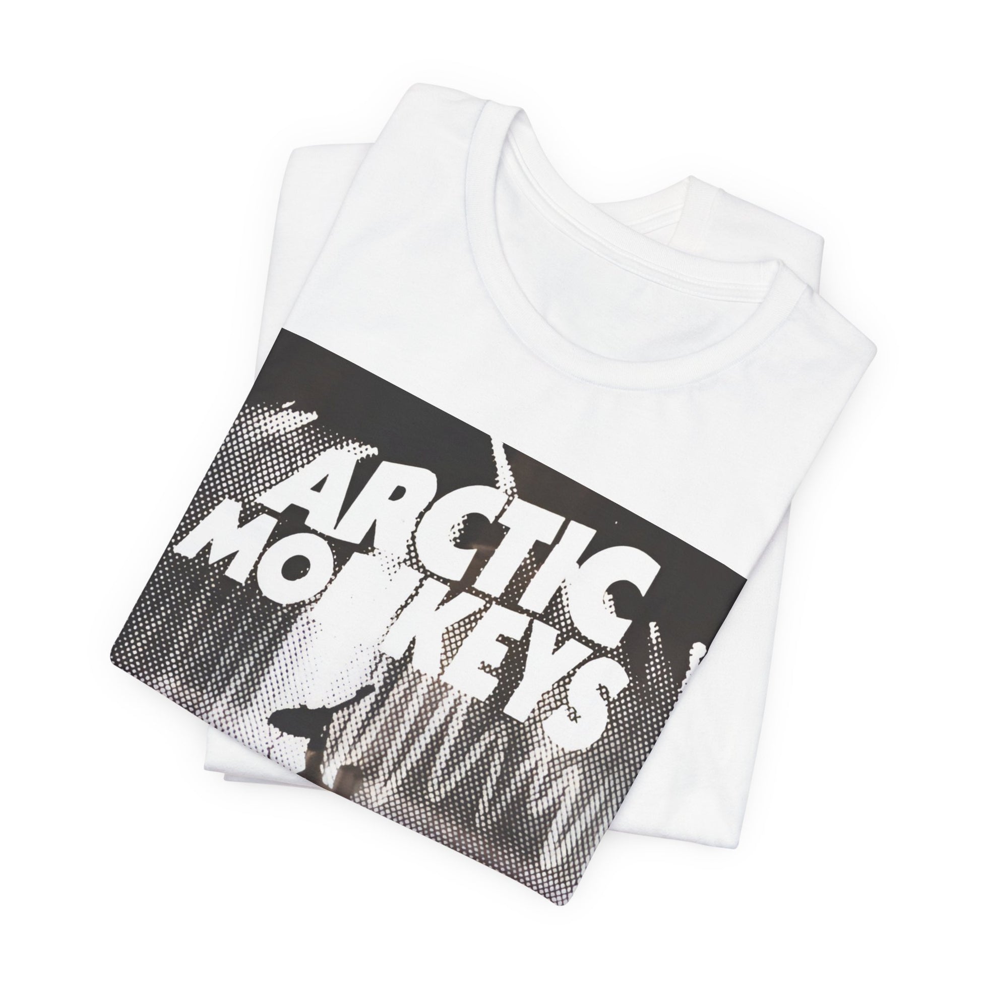A black graphic t-shirt featuring a retro-style logo for the band Arctic Monkeys.