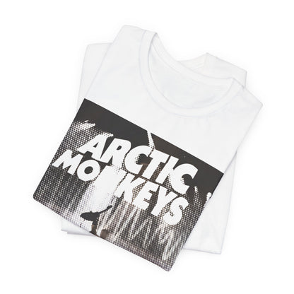 A black graphic t-shirt featuring a retro-style logo for the band Arctic Monkeys.