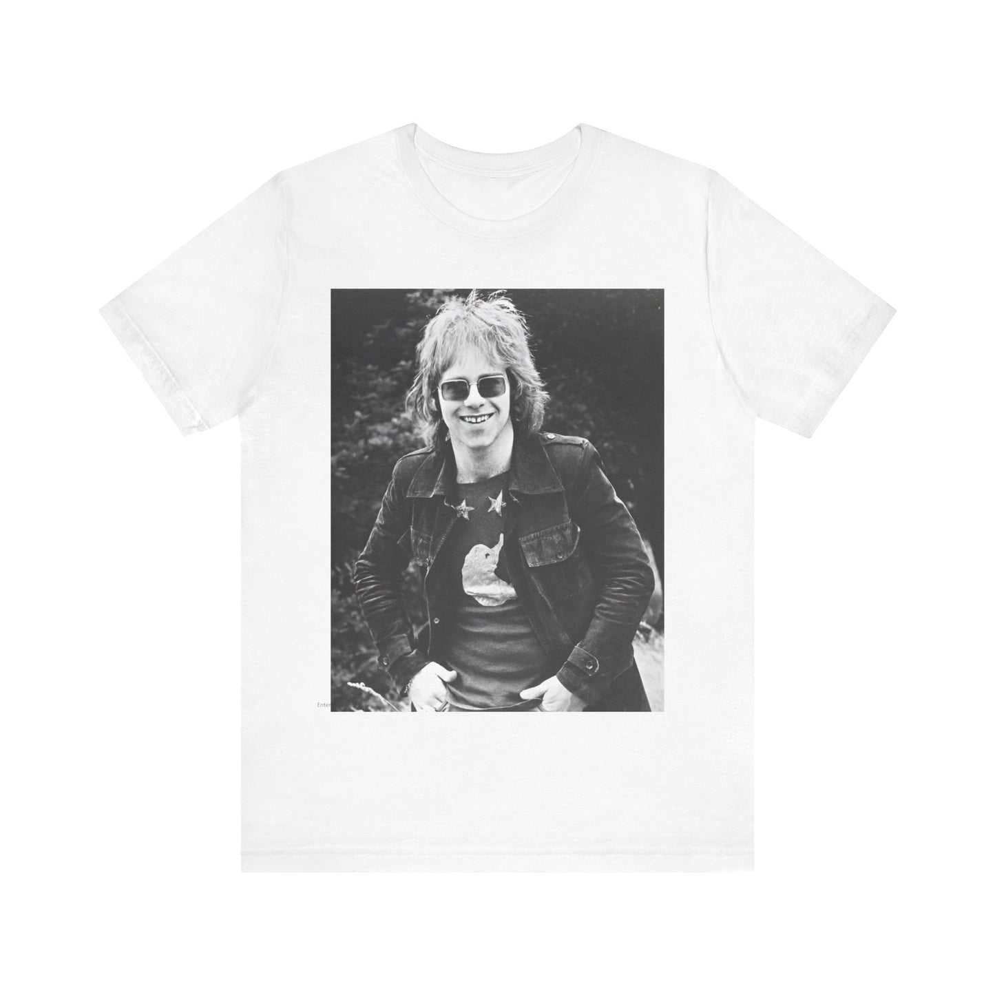 A black graphic t-shirt featuring a 70s black and white monochrome graphic or photo of Elton John.