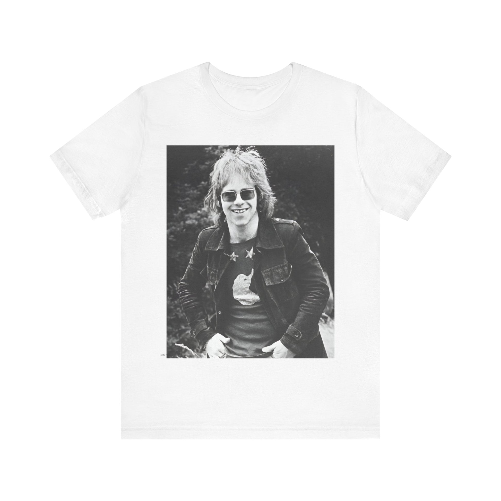 A black graphic t-shirt featuring a 70s black and white monochrome graphic or photo of Elton John.