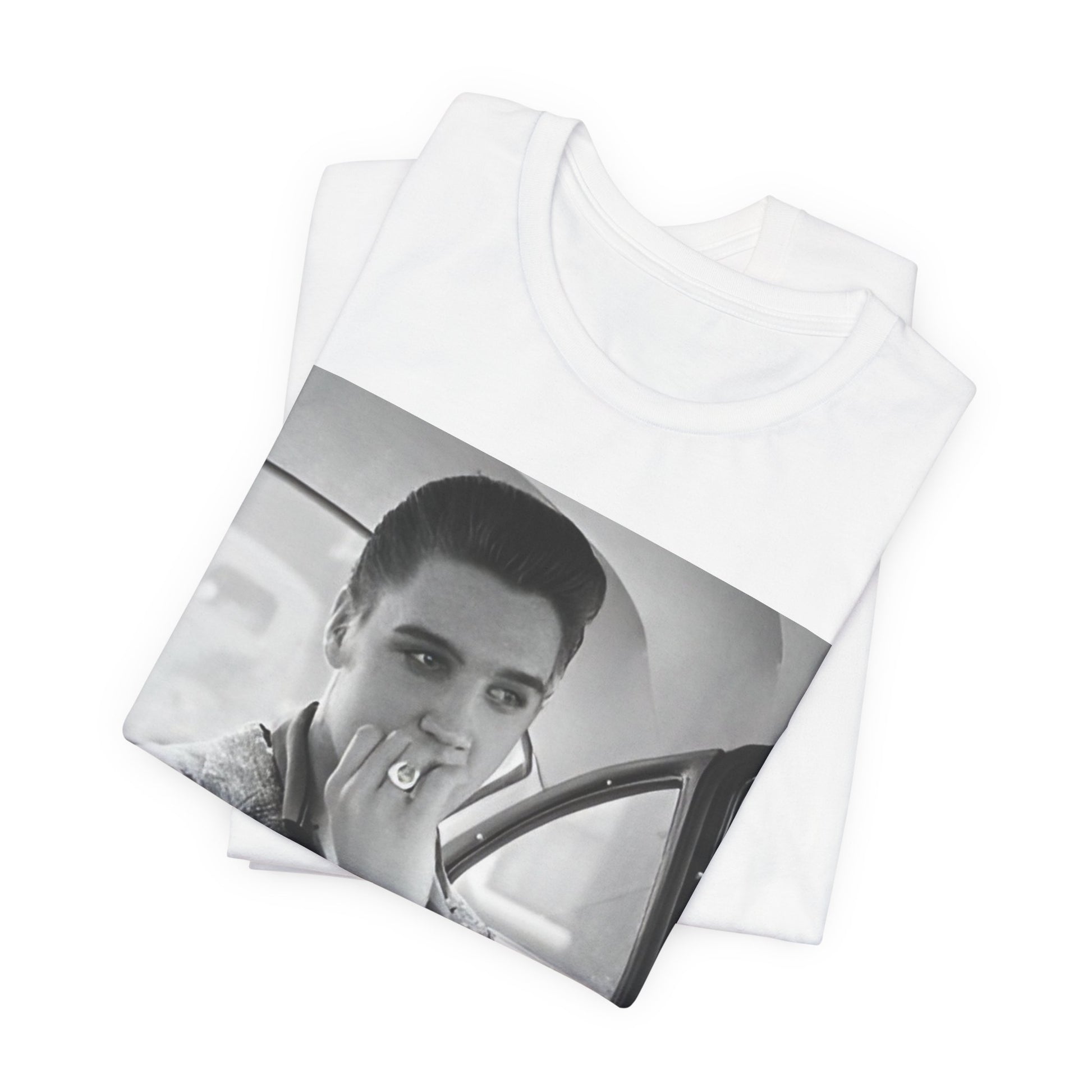 A black graphic t-shirt featuring a classic 50s era graphic of Elvis Presley.